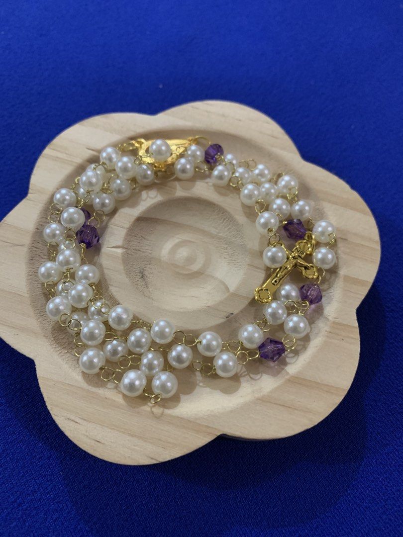 Pearl Rosary Beads with Cross Charm (Category: Charms) located in Makati City. Submitted by cordero1223 (Listing ID 1446720575, Image 2). Description: - Beautiful pearl rosary beads - Available with gold or silver tone crosses - Some feature small accent beads in purple, pink, or blue - Handmade with care - Ideal for prayer or as a thoughtful gift - Message for details on specific designs.