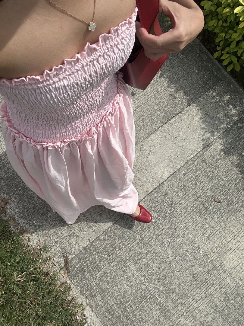 Pink Smocked Strapless Maxi Dress (Category: Dresses) located in Pasig City. Submitted by ag_cleanup (Listing ID 1446575013, Image 1). Description: - Light pink maxi dress - Strapless design - Smocked bodice - Flowy skirt - Comfortable and breezy fabric - Ideal for casual outings or beach days - Pairs well with sandals or heels.