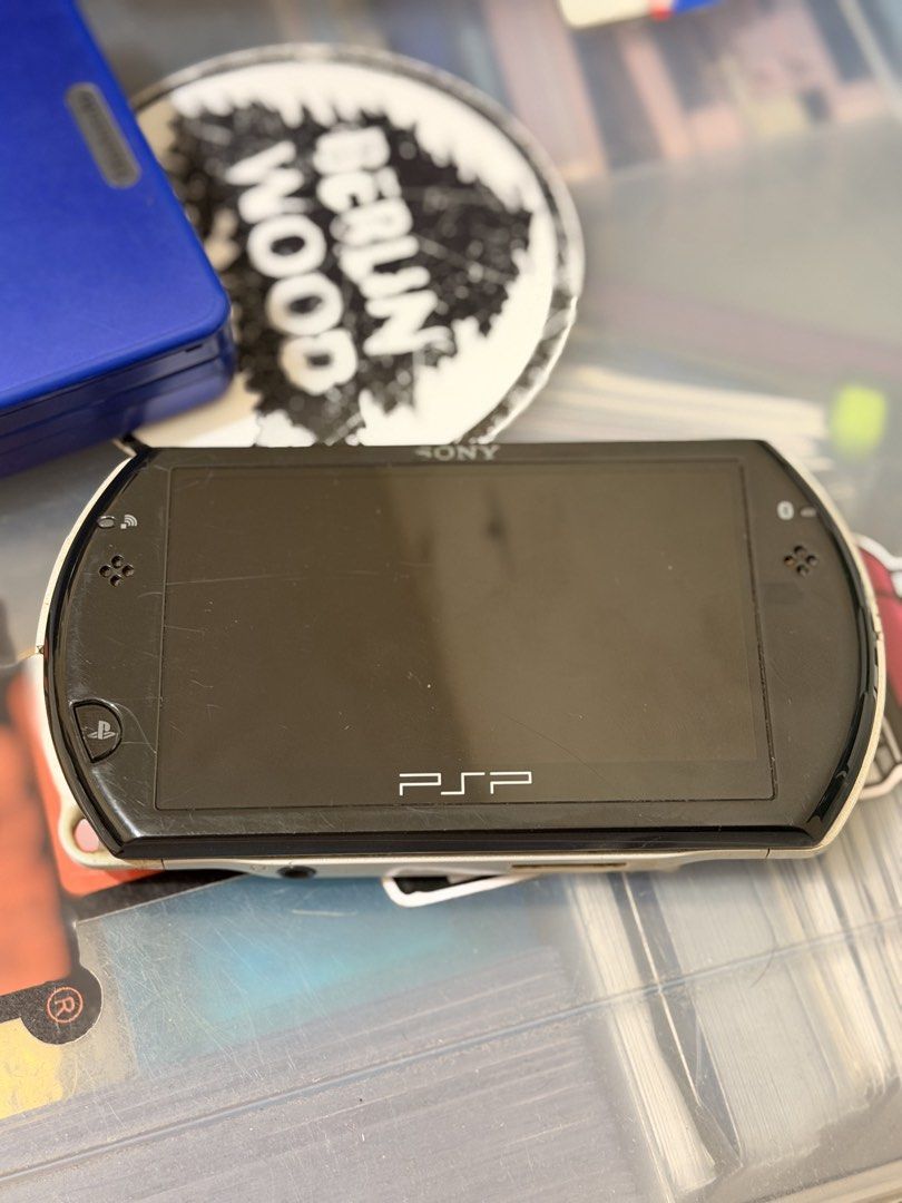PSP GO (Category: PlayStation) located in Tarlac. Submitted by arteesan (Listing ID 1446561252, Image 2). Description: PSP GO 16GB internal CFW ready Charging cable M2 adapter with original 32GB sd card Makunat battery Issue: signs of usage. Scratch sa shell pero di naman halata pag gaming. .