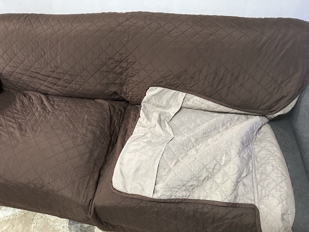 Quilted Sofa Cover - Brown (Category: Sofas) located in Pasay City. Submitted by behua (Listing ID 1446642952, Image 2). Description: - Protects your sofa from spills and wear. - Reversible design with a light beige lining. - Fits a standard 2-3 seater sofa. - Easy to put on and take off. - Keeps your furniture looking fresh and new..