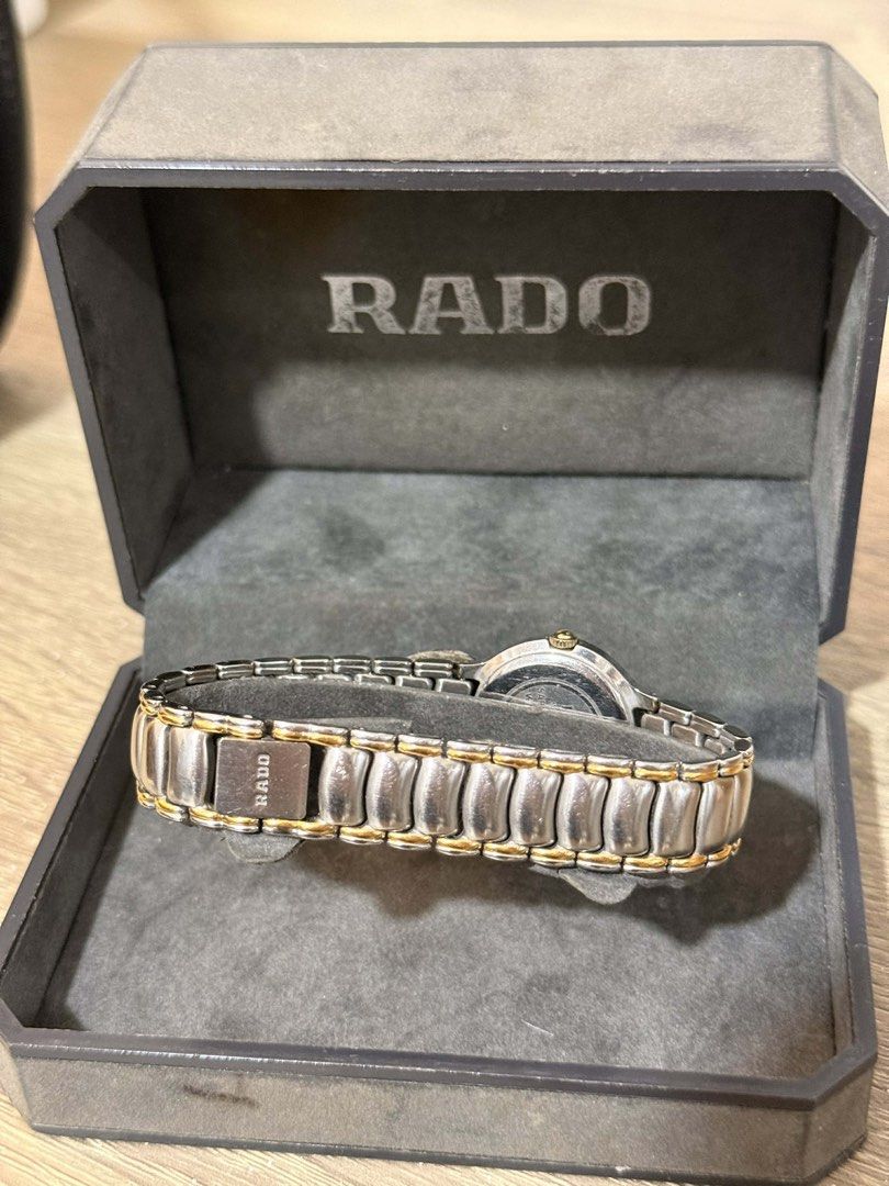 Rado Florence Two-Tone Quartz Watch (Category: Luxury Watches) located in Manila. Submitted by justhazel (Listing ID 1446582579, Image 2). Description: - Rado Florence Watch - Two-tone stainless steel and gold-plated bracelet - Classic gold dial - Includes original Rado box - Battery recently replaced - A timeless addition to your collection.