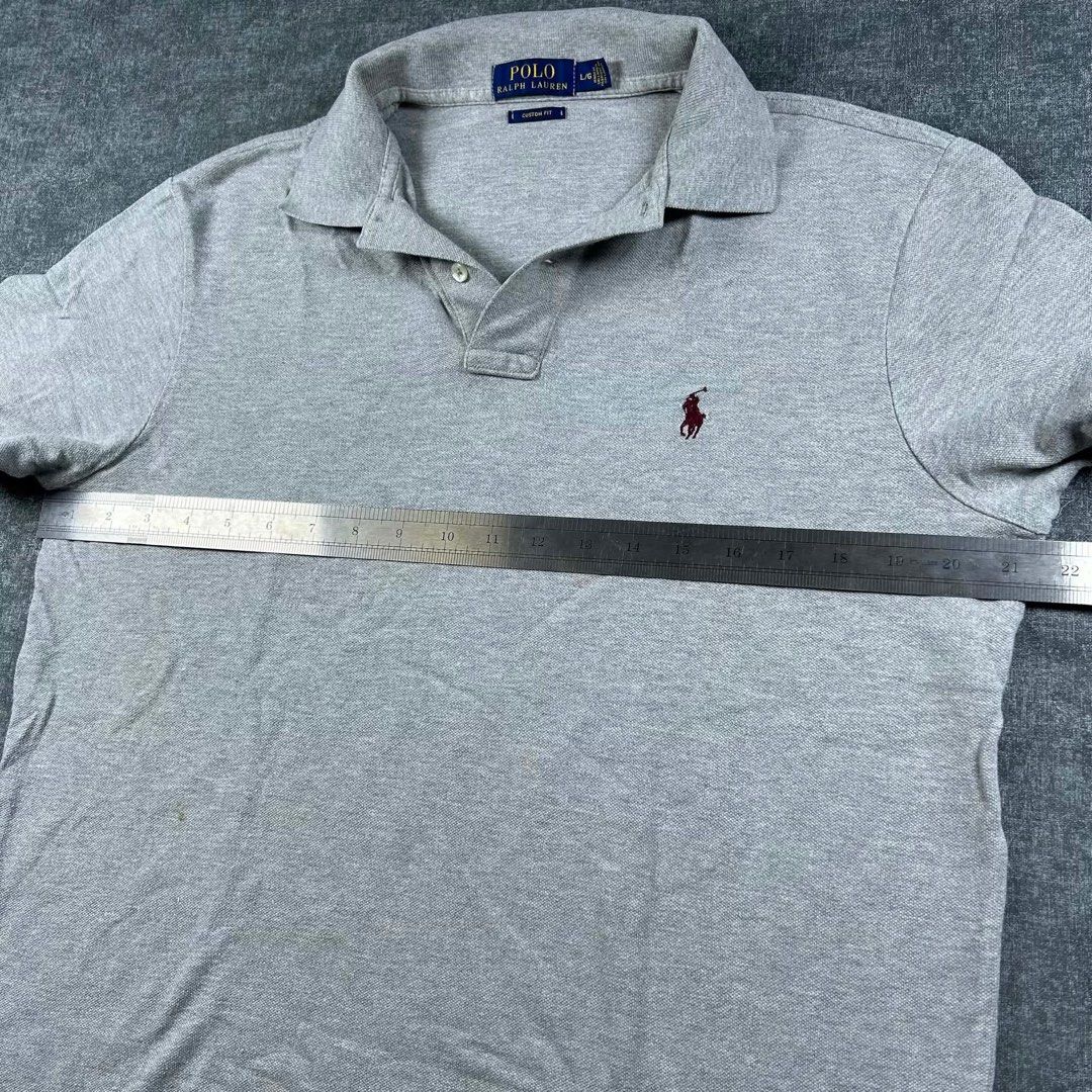 Ralph Lauren Grey Polo Shirt (Category: Tshirts & Polo Shirts ) located in Manila. Submitted by emvishop (Listing ID 1446609507, Image 2). Description: Ralph Lauren Grey Polo Shirt Price: PHP 600 Size: Large Dimension: 21.5 x 27 Condition: Good Condition Issue: stains and yellowing Store SKU: A-65 Please don’t hesitate to message us for inquiries or assistance with your transaction. (take note that the color may appear different due to lighting c