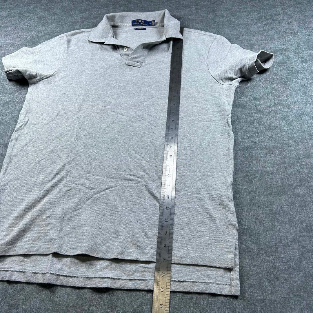 Ralph Lauren Grey Polo Shirt (Category: Tshirts & Polo Shirts ) located in Manila. Submitted by emvishop (Listing ID 1446609507, Image 3). Description: Ralph Lauren Grey Polo Shirt Price: PHP 600 Size: Large Dimension: 21.5 x 27 Condition: Good Condition Issue: stains and yellowing Store SKU: A-65 Please don’t hesitate to message us for inquiries or assistance with your transaction. (take note that the color may appear different due to lighting c
