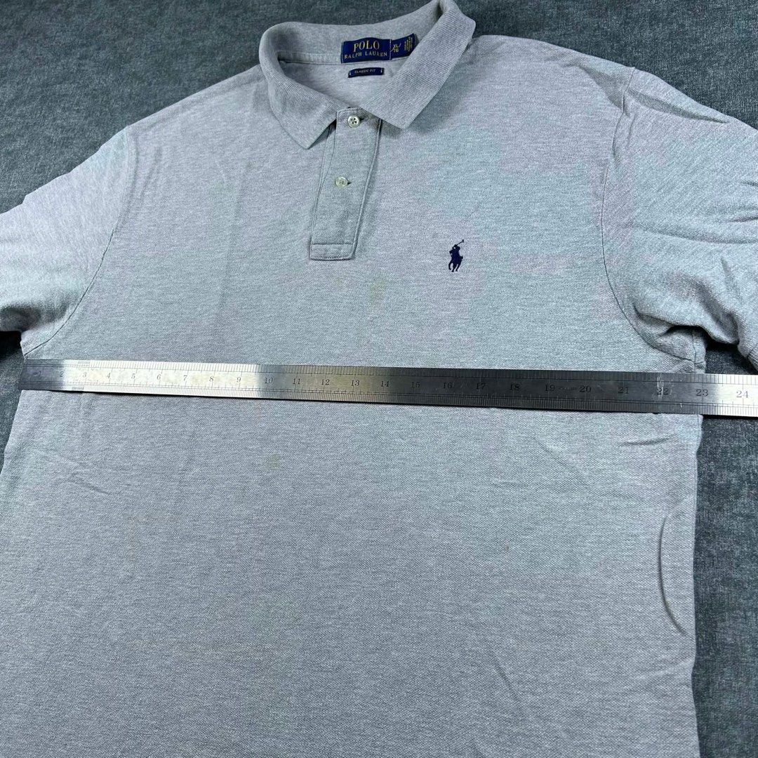 Ralph Lauren Grey Polo Shirt (Category: Tshirts & Polo Shirts ) located in Manila. Submitted by emvishop (Listing ID 1446609779, Image 2). Description: Ralph Lauren Grey Polo Shirt Price: PHP 600 Size: Extra Large Dimension: 23 x 31 Condition: Good Condition Issue: stains and yellowing Store SKU: A-66 Please don’t hesitate to message us for inquiries or assistance with your transaction. (take note that the color may appear different due to lighti