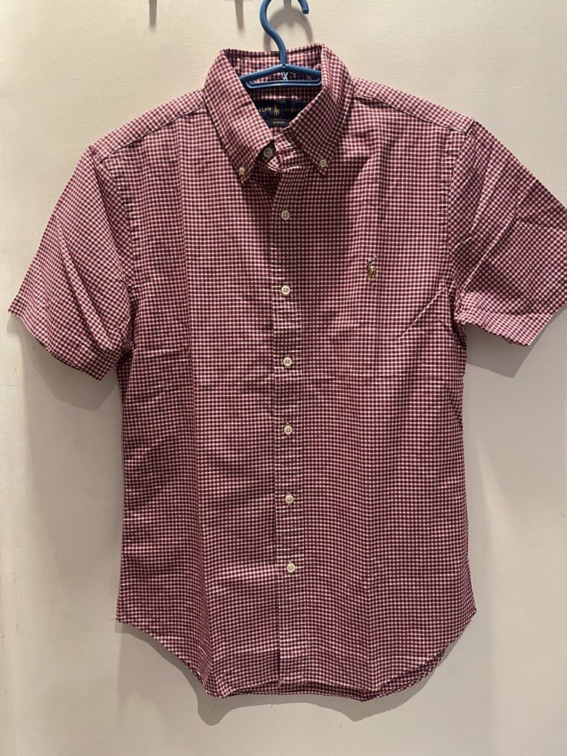 Ralph Lauren short-sleeve button-down shirt (Category: Tshirts & Polo Shirts ) located in Angeles City. Submitted by binostuff (Listing ID 1444788292, Image 1). Description: Ralph Lauren red gingham short-sleeve button-down shirt Size: M/M, Slim Fit Condition: Brand new, factory-bought 100% authentic. Classic red and white checkered design with button-down collar and embroidered pony logo..