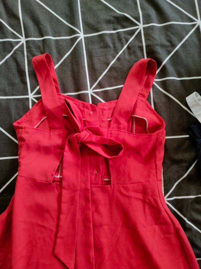 Red Button Front Midi Dress with Tie Straps (Category: Dresses) located in Manila. Submitted by thatstyle (Listing ID 1446552463, Image 2). Description: - Cute red midi dress - Functional buttons down the front - Adjustable tie straps at the shoulders - Designed for a flattering fit - Versatile for casual outings or dressing up - Easy and comfortable to wear.