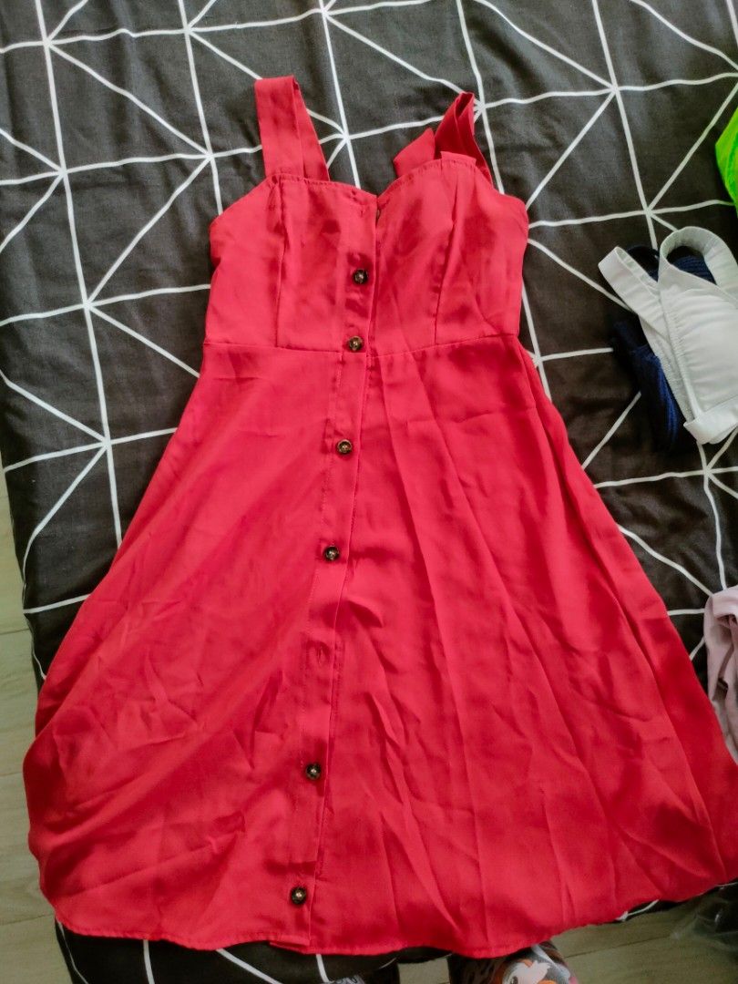Red Button Front Midi Dress with Tie Straps (Category: Dresses) located in Manila. Submitted by thatstyle (Listing ID 1446552463, Image 1). Description: - Cute red midi dress - Functional buttons down the front - Adjustable tie straps at the shoulders - Designed for a flattering fit - Versatile for casual outings or dressing up - Easy and comfortable to wear.