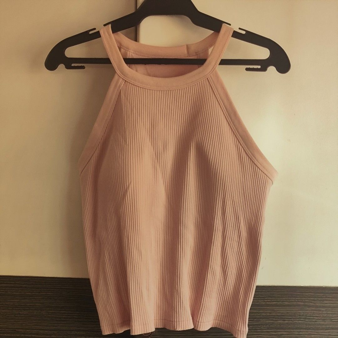 Ribbed Halter Neck Tank Top - Pink (Category: Sleeveless) located in Manila. Submitted by eeb0101 (Listing ID 1446652487, Image 1). Description: - Cute pink ribbed tank top - Halter neck style - Super comfy and stretchy material - Great for layering or wearing on its own - Easy to pair with jeans or skirts - A simple wardrobe staple.