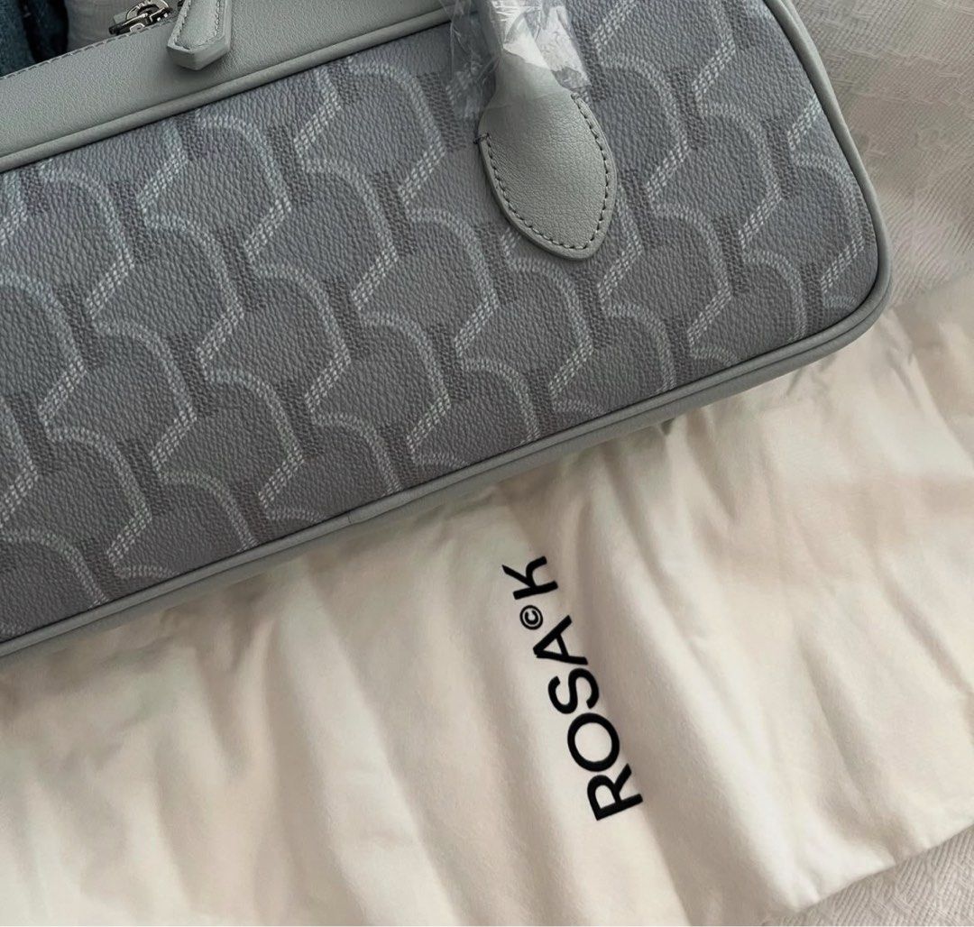 ROSA K Shoulder Bag (Category: Shoulder Bags) located in San Juan City. Submitted by ipoundless (Listing ID 1446673128, Image 2). Description: - Brand: ROSA K - Style: Shoulder Bag - Color: Grey - Size: MM - Material: Synthetic leather with cow leather details - Features: Signature monogram pattern - Includes: Dust bag and tags - Original Purchase Price: ₩248,000.