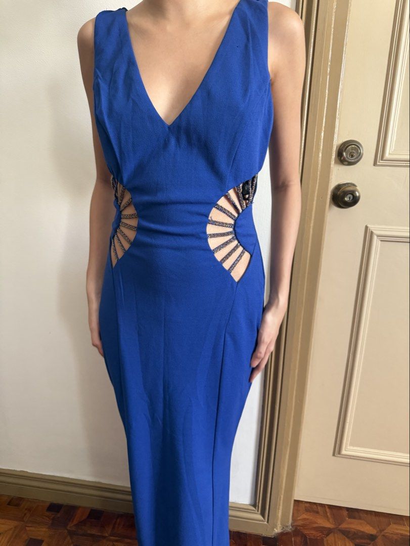 Royal blue cutout dress (Category: Evening dresses & gowns) located in Makati City. Submitted by blingbinz (Listing ID 1446558918, Image 1). Description: - fits small (stretchable material) - from the states - got for $50.