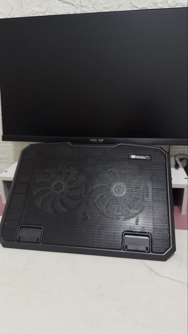OG Silvertec Laptop Cooler with Dual Fans (Category: Laptops & Notebooks) located in Manila. Submitted by rhinrin (Listing ID 1446593956, Image 1). Description: Original price - 1,100. Selling for 350 - Black laptop cooling pad - Two built-in fans for optimal cooling - USB powered for convenience - Two additional USB ports on the side - Adjustable stand for ergonomic viewing angles - Ideal for extended gaming or work sessions.