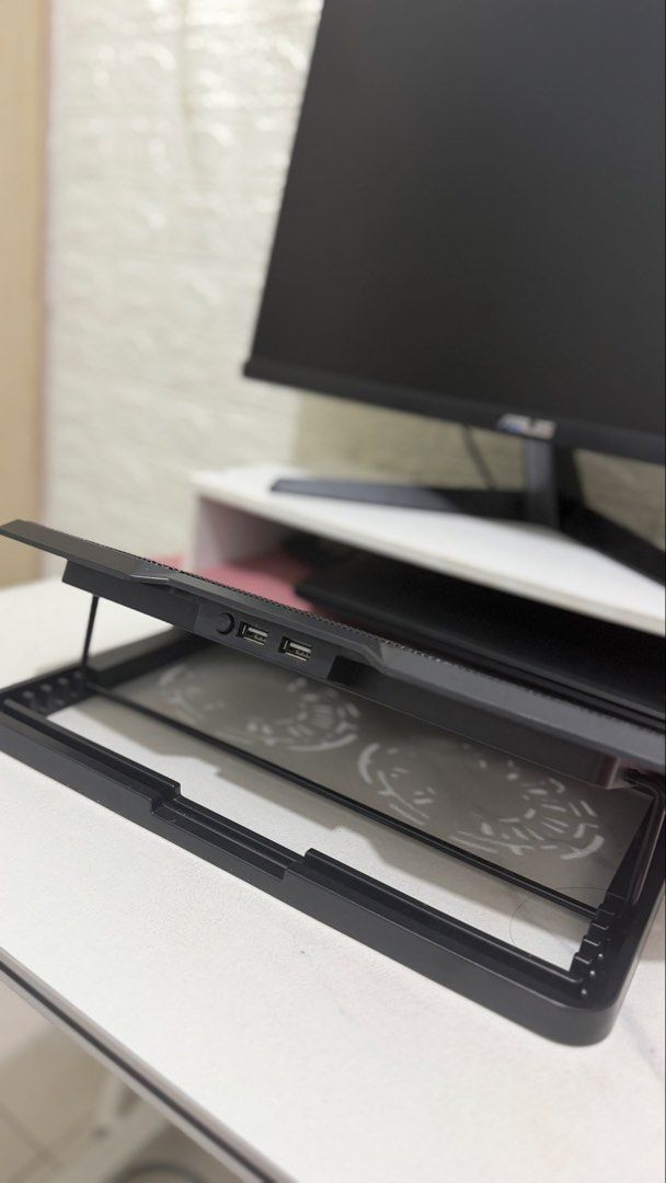 OG Silvertec Laptop Cooler with Dual Fans (Category: Laptops & Notebooks) located in Manila. Submitted by rhinrin (Listing ID 1446593956, Image 3). Description: Original price - 1,100. Selling for 350 - Black laptop cooling pad - Two built-in fans for optimal cooling - USB powered for convenience - Two additional USB ports on the side - Adjustable stand for ergonomic viewing angles - Ideal for extended gaming or work sessions.