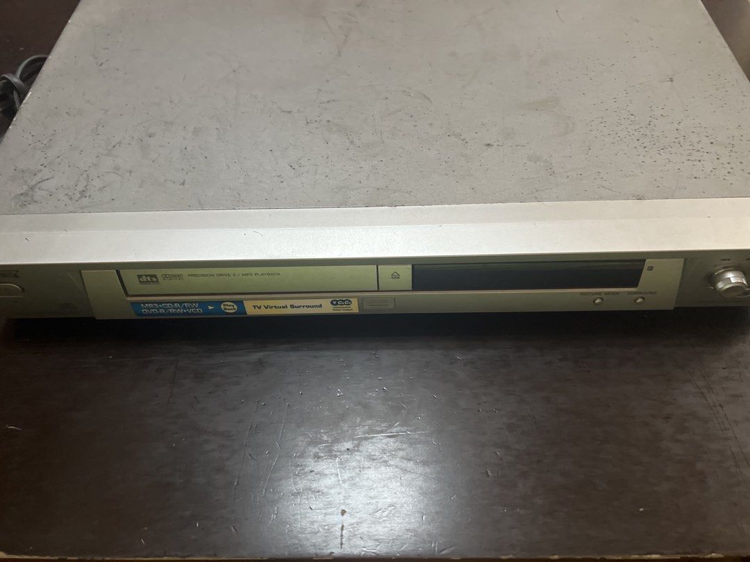 Sony DVD CD Video CD Player Precision Drive 2 for parts (Category: Blu-Ray & Media Players) located in Las Pinas. Submitted by jerri44 (Listing ID 1446568977, Image 1). Description: - Plays DVD, CD, Video CD, and MP3 discs - Features DTS Digital Surround and TV Virtual Surround - Equipped with Precision Drive 2 technology - All connection ports visible in the back photos Note: Trying to test dvd but not loading probably needs head cleaner.