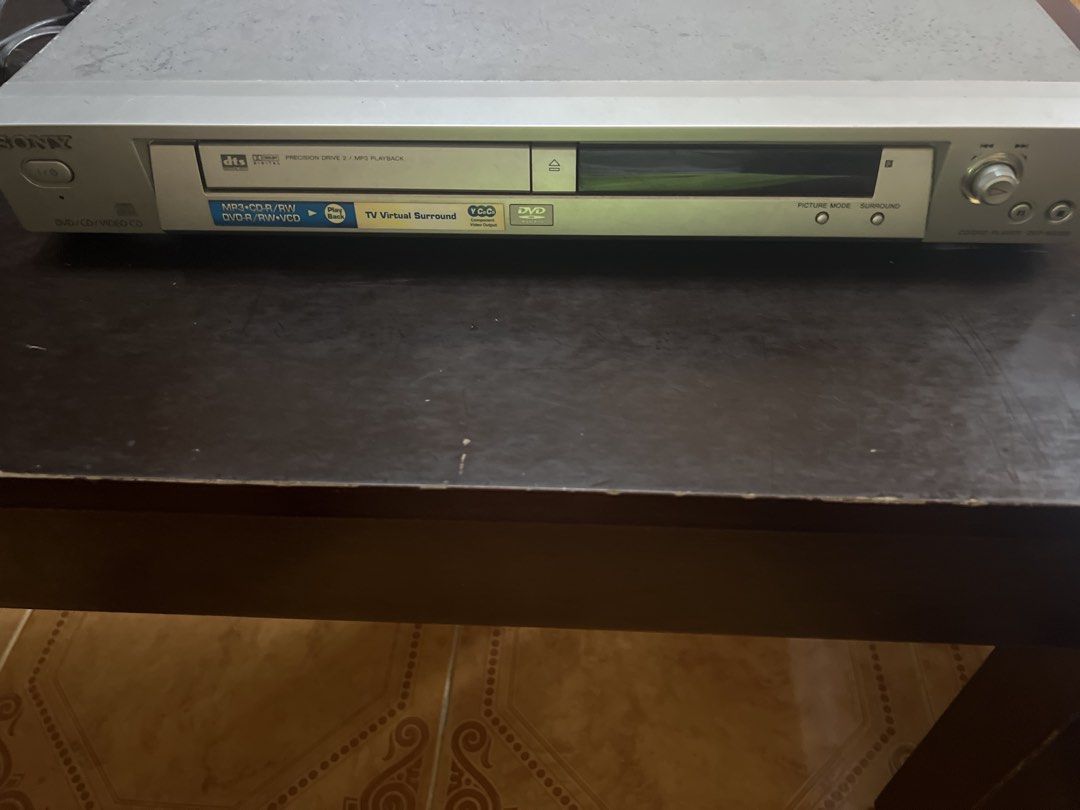 Sony DVD CD Video CD Player Precision Drive 2 for parts (Category: Blu-Ray & Media Players) located in Las Pinas. Submitted by jerri44 (Listing ID 1446568977, Image 3). Description: - Plays DVD, CD, Video CD, and MP3 discs - Features DTS Digital Surround and TV Virtual Surround - Equipped with Precision Drive 2 technology - All connection ports visible in the back photos Note: Trying to test dvd but not loading probably needs head cleaner.