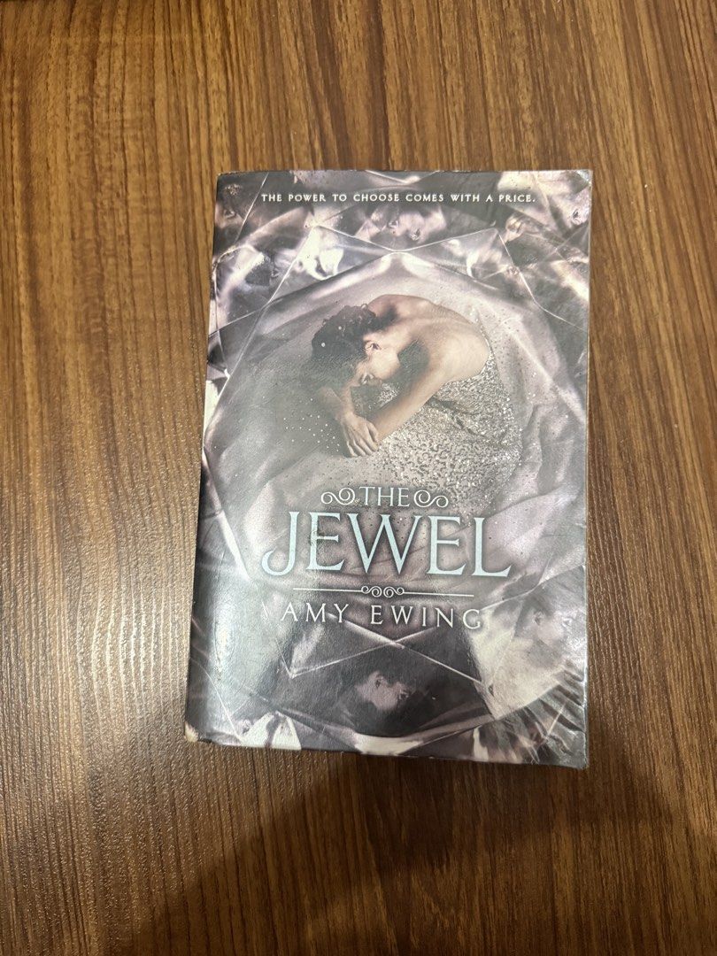 the jewel by amy ewing (Category: Storybooks) located in Carmona. Submitted by stuffnvrything (Listing ID 1446598125, Image 1). Description: - with plastic cover - bought it at ₱435.