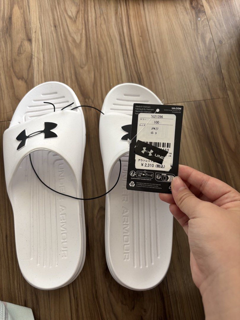 Under Armour White Slides Size 9 (Category: Slippers & Slides) located in Manila. Submitted by bellepastriesandmore (Listing ID 1446697232, Image 3). Description: Selling brandnew White Under Armour slides for only 899 price is still negotiable -Size: 9 US - Features embossed 'UNDER ARMOUR' logo on footbed and sole - Brand new with original tags attached - Ideal for casual wear or post-sports relaxation.