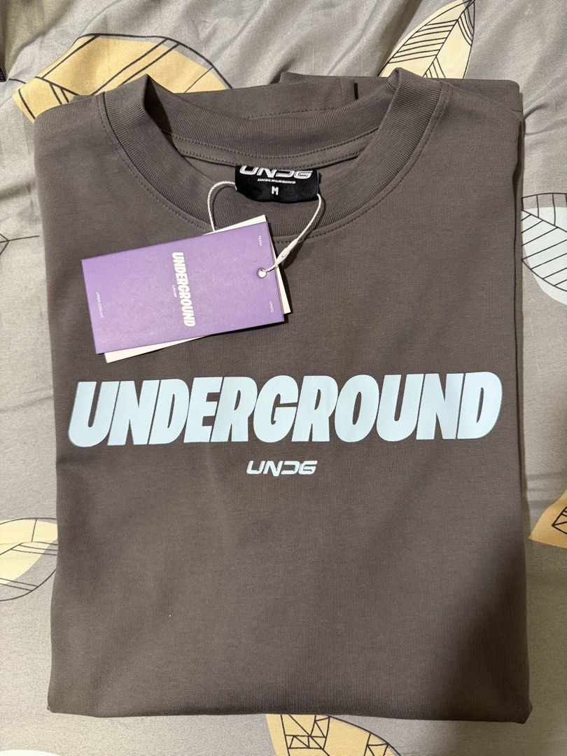UNDG Basic Tee (Cloudy) (Category: Tshirts & Polo Shirts) located in Singapore. Submitted by chester_27 (Listing ID 1445480746, Image 3). Description: UNDG Basic Tee (Cloudy) Size M Condition: Brand New with Tag RFS: wrong size.