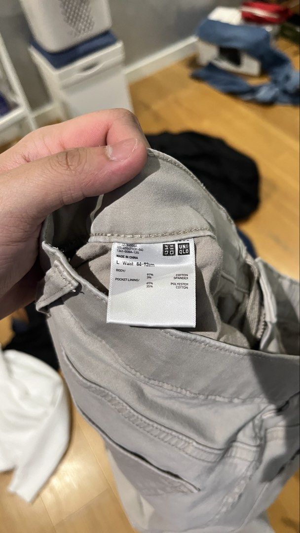 Uniqlo Chinos Light Grey Pants (Category: Chinos) located in Quezon City. Submitted by luissso_ (Listing ID 1446571094, Image 3). Description: - Uniqlo Light Grey Chinos - Straight Fit - Comfortable for everyday wear - Waist Size: 84-92cm - Material: Cotton and Polyester Blend - Versatile: Great for casual or smart casual outfits - Easy to pair with any top.