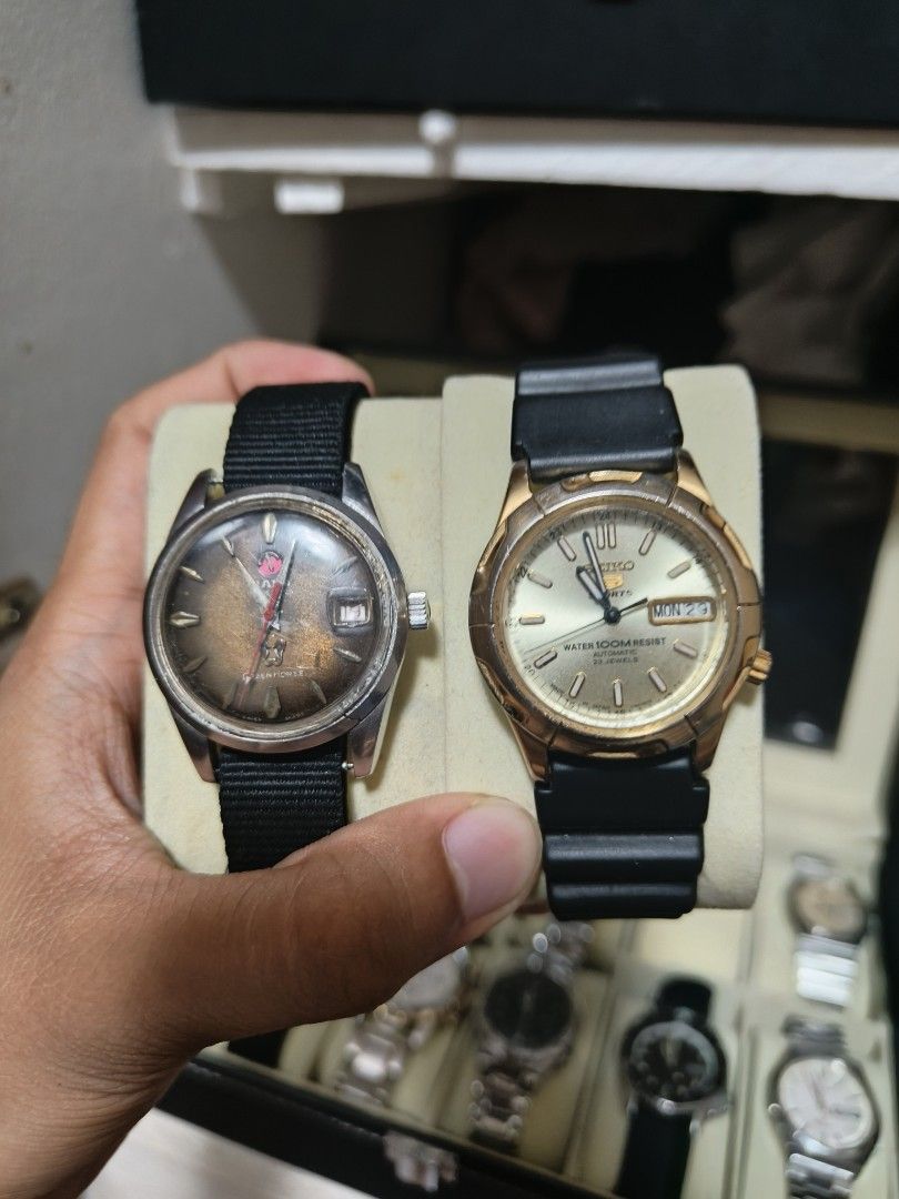 Vintage Rado & Seiko 5 Automatic Watches (Category: Men's Watches) located in Quezon City. Submitted by yglewis13 (Listing ID 1446687884, Image 2). Description: - Vintage Rado automatic watch with black NATO strap - Gold-tone Seiko 5 automatic watch with black rubber strap - Both watches are functional and ready to wear - Ideal for watch collectors - Great value when buying both pieces together -good cond and recently serviced seiko 5 and new str