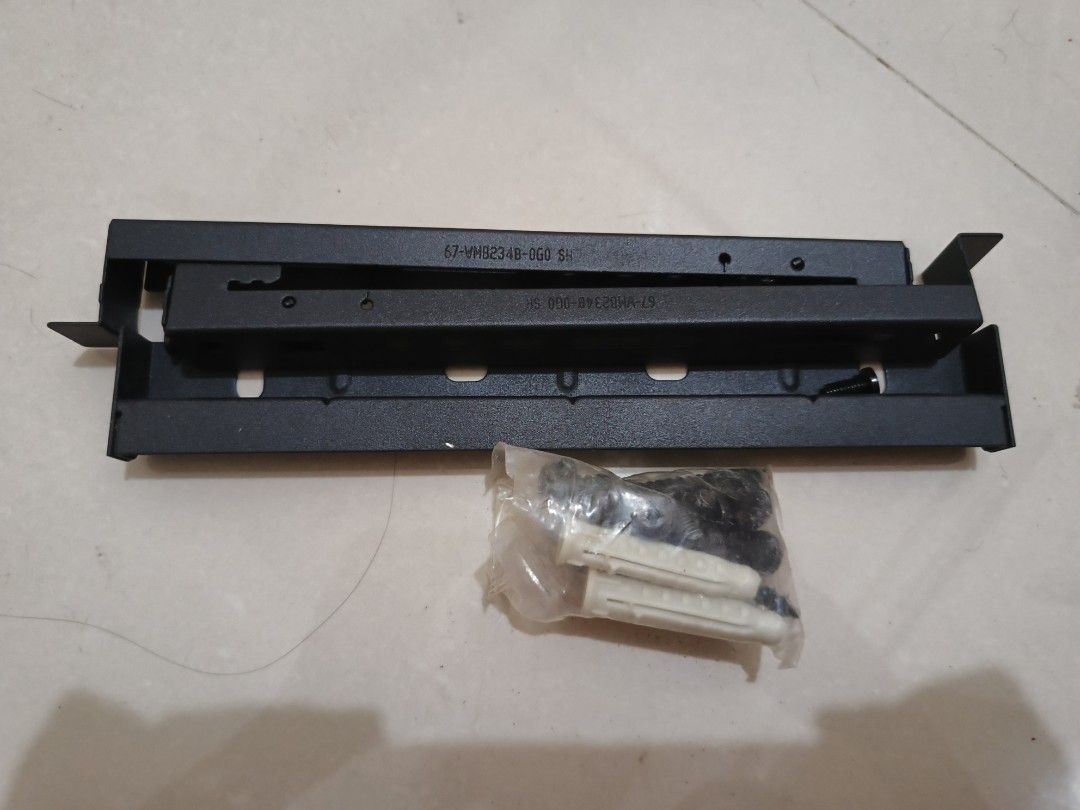Wall Mount Bracket WMB234 for TCL TV Set (Category: TV Parts & Accessories) located in Manila. Submitted by alfonsopre35042 (Listing ID 1446600664, Image 2). Description: - Wall mount bracket, model WMB234 - Specifically designed for TCL TV sets - Complete with screws and wall plugs - Package dimensions: 325 x 47 x 35 mm - Gross weight: 0.5kg - Please check photos for more details hindi pa po nagagamit RFS: declutter and need funds for my cats an