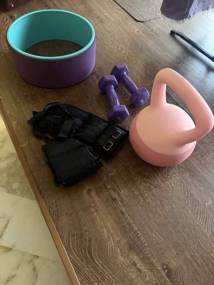 Weights (Category: Weights & Dumbbells) located in Singapore. Submitted by sivapriya01 (Listing ID 1446679481, Image 3). Description: 2kg dumbbell x 2 6kg kettle bell x 1 1kg ankle weight x 2 Yoga wheel x 1 Total price listed below. Message for individual prices .