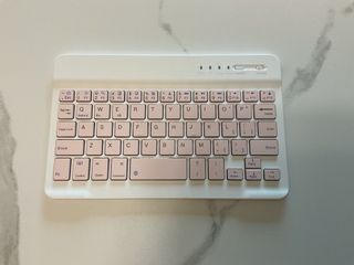 White Bluetooth Keyboard with Pink Keys507968097627688960