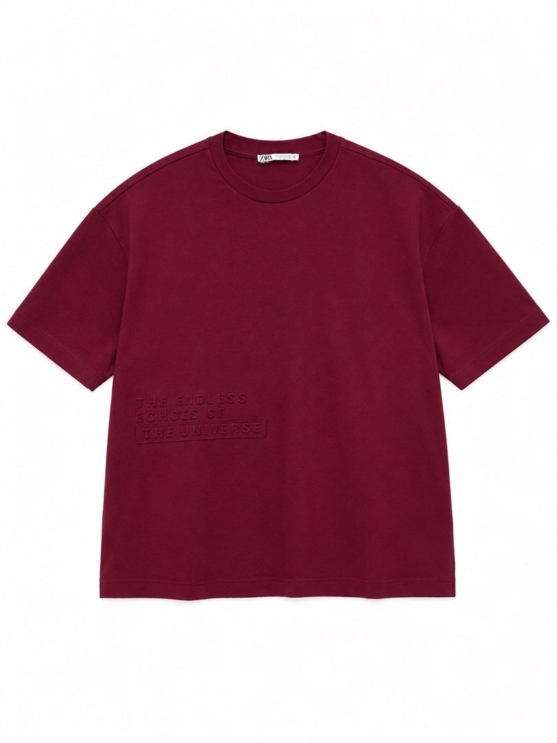ZARA Burgundy Sweatshirt with Embossed Text - Small (Category: Tshirts & Polo Shirts ) located in Quezon City. Submitted by closetrm131 (Listing ID 1446618107, Image 1). Description: - Brand: ZARA - Color: Burgundy - Design: Embossed text on front: 'THE ENDLESS ECHOES OF THE UNIVERSE' - Sleeves: Short - Neckline: Crew neck - Material: Made in Turkey - Size: S (EUR S, USAS M) - Style: Casual wear.