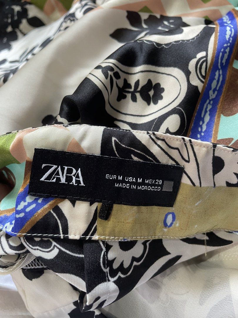 Zara Patchwork Halter Neck Midi Dress (Category: Dresses) located in Makati City. Submitted by jzzarra (Listing ID 1446592671, Image 3). Description: Seldom worn Long halter neck dress, Vibrant patchwork print (paisley, floral, geometric), Ties at the neck Size: M .