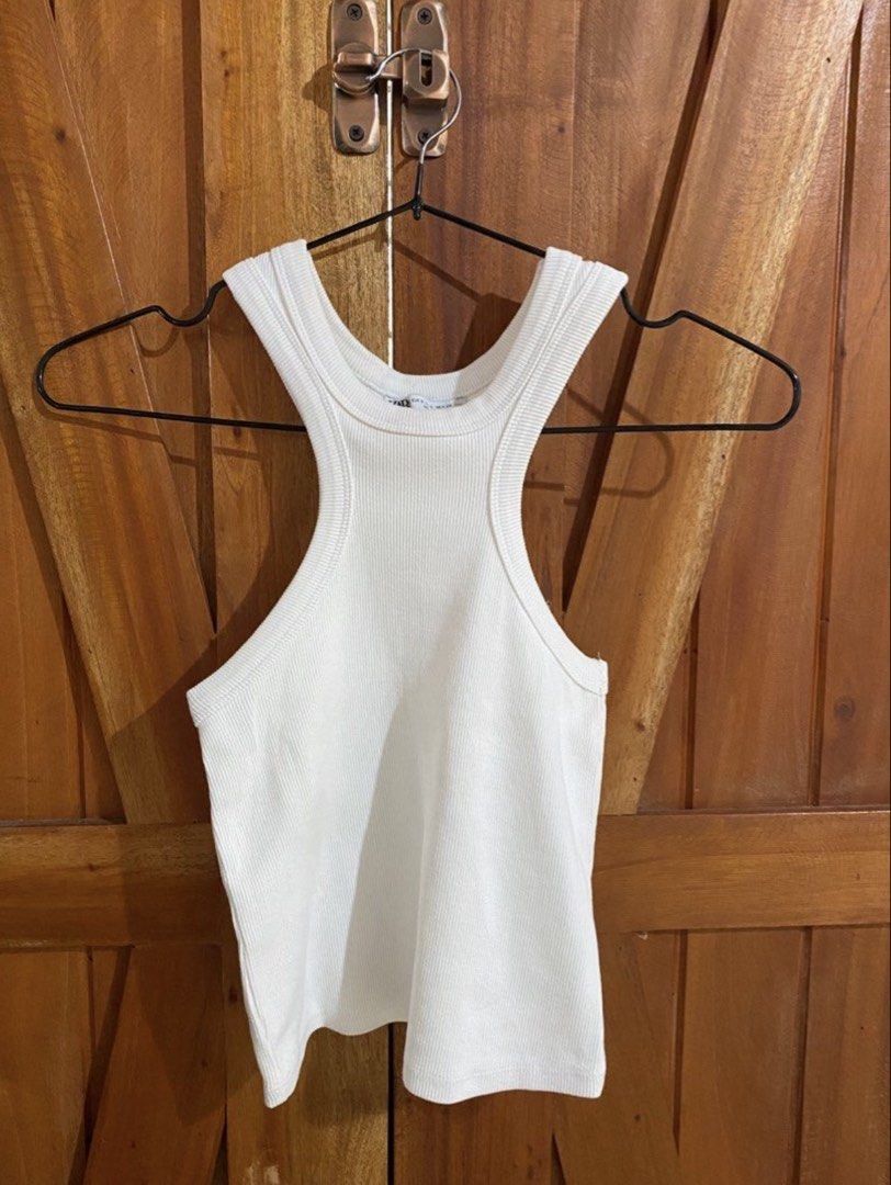 Zara Ribbed Racerback Halter Tank Top (Category: Sleeveless) located in Marikina City. Submitted by moonchok (Listing ID 1446579848, Image 2). Description: - Zara ribbed racerback tank tops - Available in black and white - Stretchy material for a comfortable fit - Essential wardrobe basics - Versatile for layering or wearing on its own -worn once!! -250 each -made in TURKEY.
