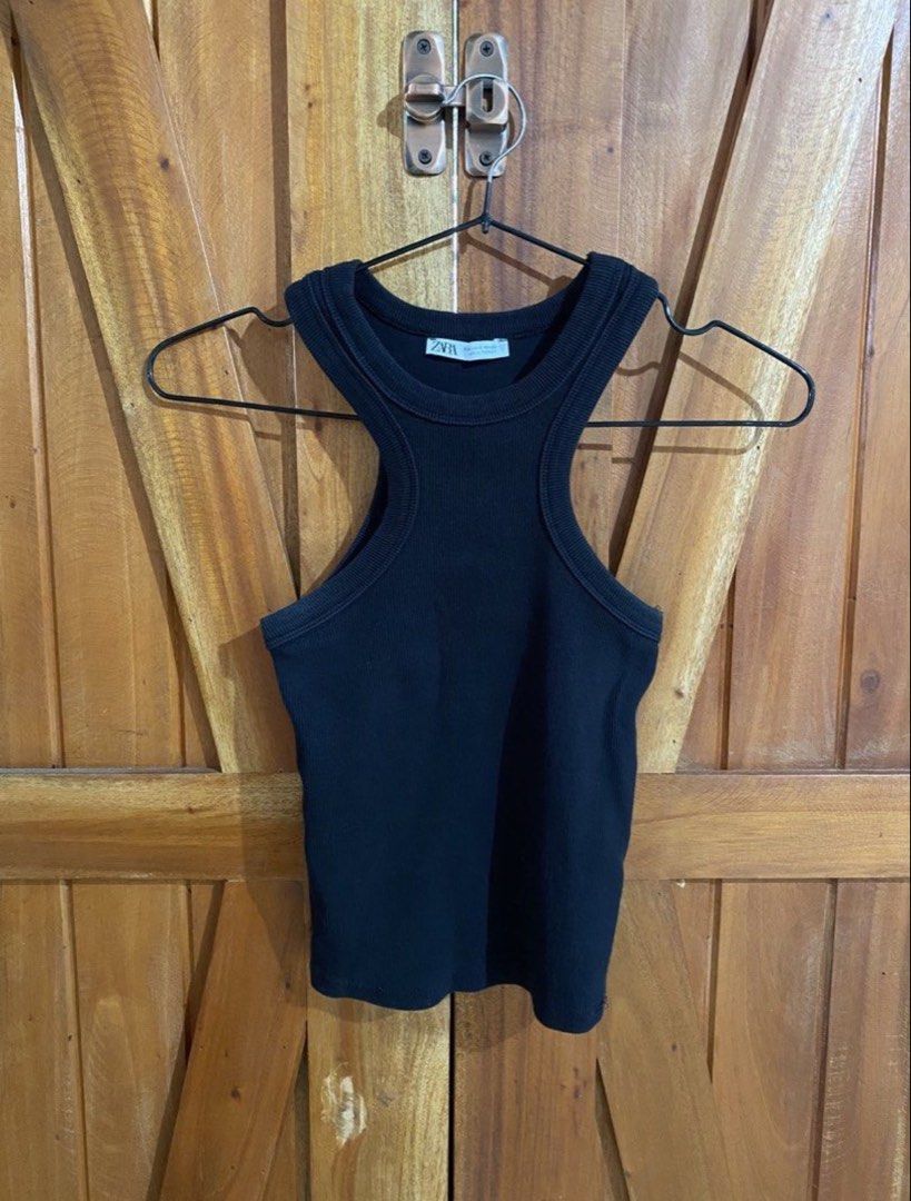 Zara Ribbed Racerback Halter Tank Top (Category: Sleeveless) located in Marikina City. Submitted by moonchok (Listing ID 1446579848, Image 1). Description: - Zara ribbed racerback tank tops - Available in black and white - Stretchy material for a comfortable fit - Essential wardrobe basics - Versatile for layering or wearing on its own -worn once!! -250 each -made in TURKEY.