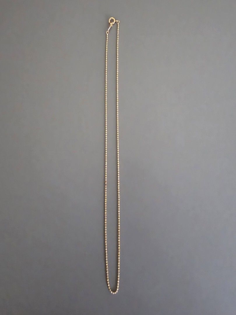 18K Yellow Gold Beaded Thin Chain Necklace (Category: Necklaces) located in Makati City. Submitted by Gkyutie (Listing ID 1441683545, Image 3). Description: This classic beaded chain is made of 18K solid yellow gold. A simple, minimal design suitable for everyday wear. Length 42cm Weight 2.4 g.