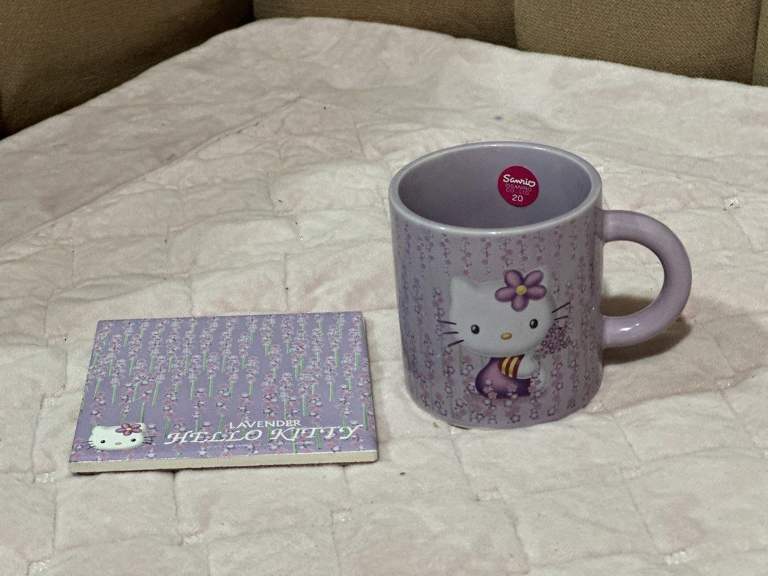 1999 Sanrio Lavender Hello Kitty Mug & Coaster Set (Category: Coffee & Tea Tableware) located in Davao. Submitted by favoritepreloved (Listing ID 1441750547, Image 2). Description: 💜 approximately 7.5cm mug height, 7cm diameter .