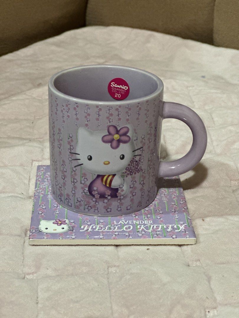 1999 Sanrio Lavender Hello Kitty Mug & Coaster Set (Category: Coffee & Tea Tableware) located in Davao. Submitted by favoritepreloved (Listing ID 1441750547, Image 1). Description: 💜 approximately 7.5cm mug height, 7cm diameter .