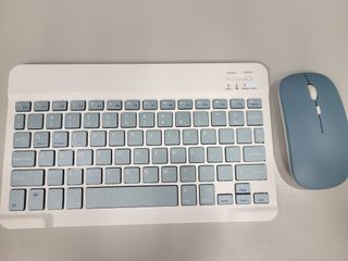 White Wireless Keyboard with Light Blue Mouse480298335040983040