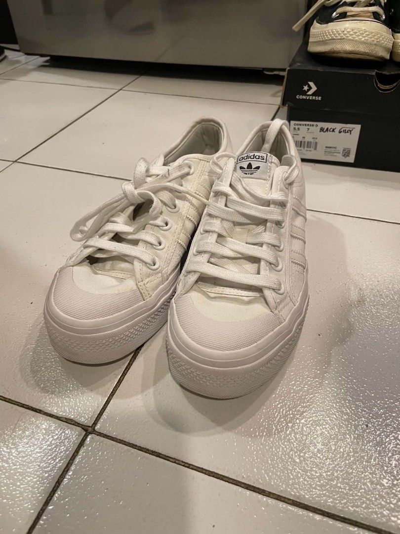 Adidas Nizza Platform White Women's Shoes (Category: Sneakers) located in Manila. Submitted by liagarcia138961 (Listing ID 1441728879, Image 2). Description: - White Adidas Nizza Platform Sneakers - Classic three-stripe design -Great for PE shoes - Size: US Women's 7.