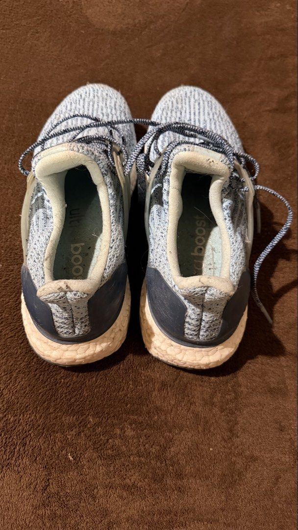 Adidas Ultraboost Running Shoes (Category: Sneakers) located in La Trinidad. Submitted by kijupiter.ph (Listing ID 1441711895, Image 2). Description: - Adidas Ultraboost running shoes - Color: Light blue and grey knit upper - Sole: White Boost cushioning - Condition: Shows some signs of wear on soles and upper - Functionality: Still has plenty of life left, great for running or casual wear Shipping on Fridays, Saturdays, & Sundays only, SF to be 