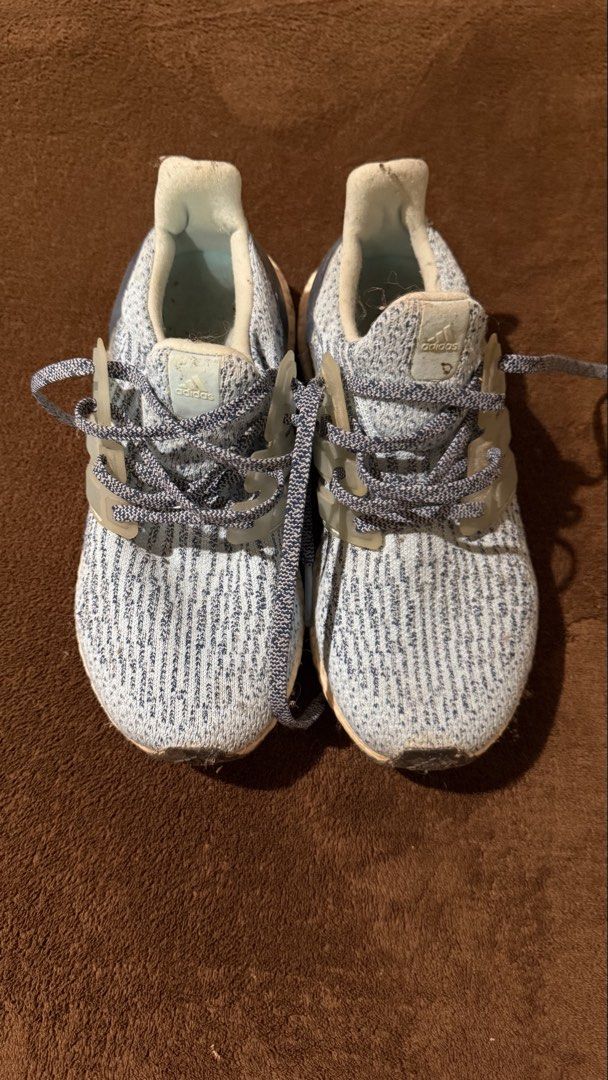 Adidas Ultraboost Running Shoes (Category: Sneakers) located in La Trinidad. Submitted by kijupiter.ph (Listing ID 1441711895, Image 1). Description: - Adidas Ultraboost running shoes - Color: Light blue and grey knit upper - Sole: White Boost cushioning - Condition: Shows some signs of wear on soles and upper - Functionality: Still has plenty of life left, great for running or casual wear Shipping on Fridays, Saturdays, & Sundays only, SF to be 