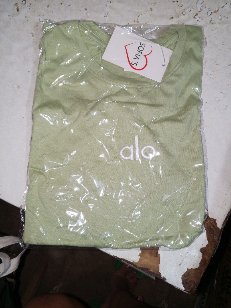 Alo Sofia S. T-shirt - Light Green (Category: Tshirts & Polo Shirts ) located in Davao. Submitted by soybean17 (Listing ID 1441643172, Image 1). Description: - Brand: Alo - Color: Light Green - Features: Alo logo on front - Condition: New, in original packaging - Includes: Sofia S. tag - Style: Basic tee, perfect for everyday wear.
