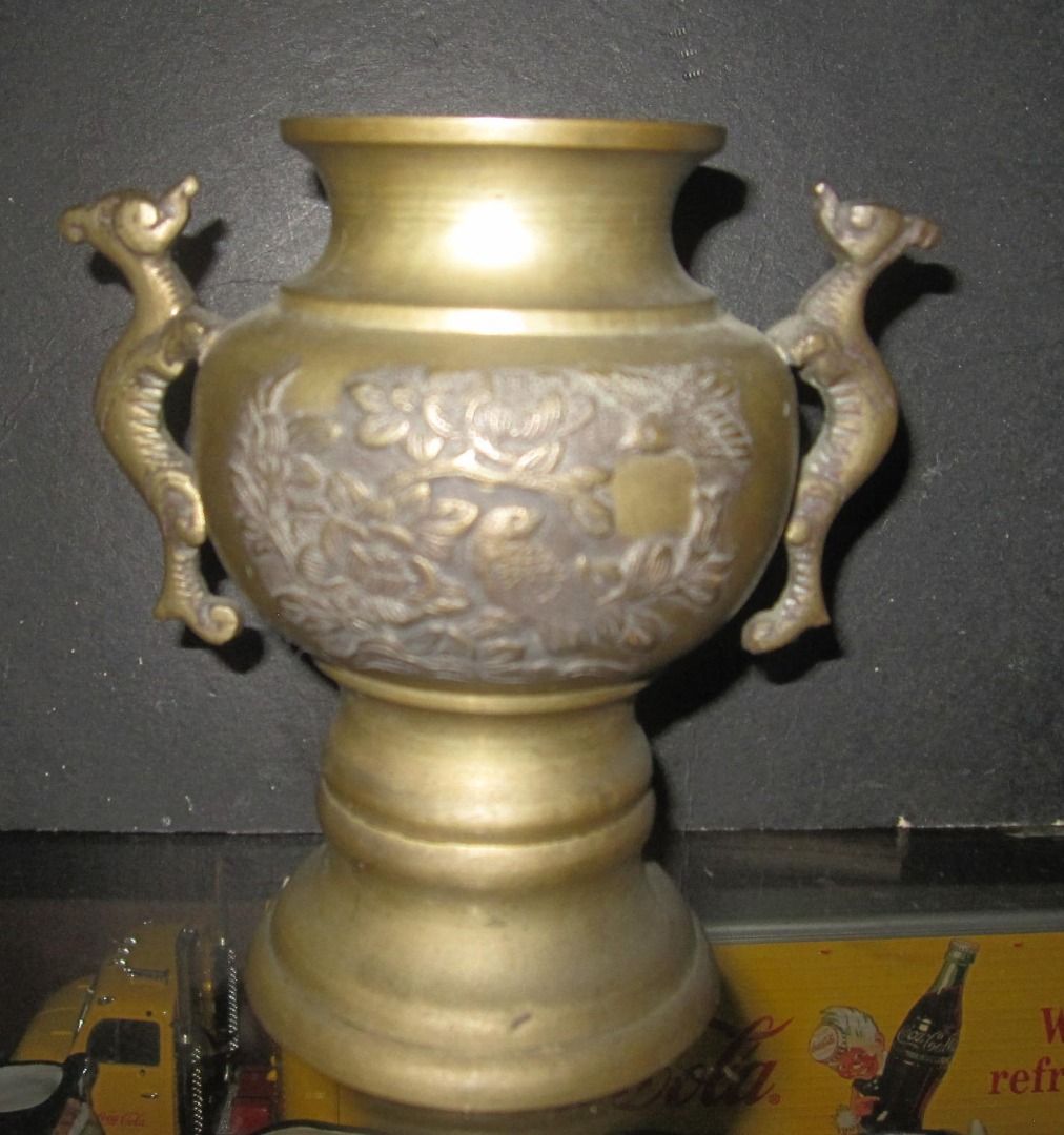 Antique Japanese Brass Vase (Category: Vases & Decorative Bowls) located in Baguio. Submitted by winstonsheebamonna (Listing ID 1441619115, Image 1). Description: Antique Japanese Brass Vase Meiji Period This is from the later part of the Meiji period 1868-1912 I purchased this at a NY Estate sale in the 70's Bird decoration is on both sides of vase. In excellent original condition. Could be polished but i prefer the original patina..