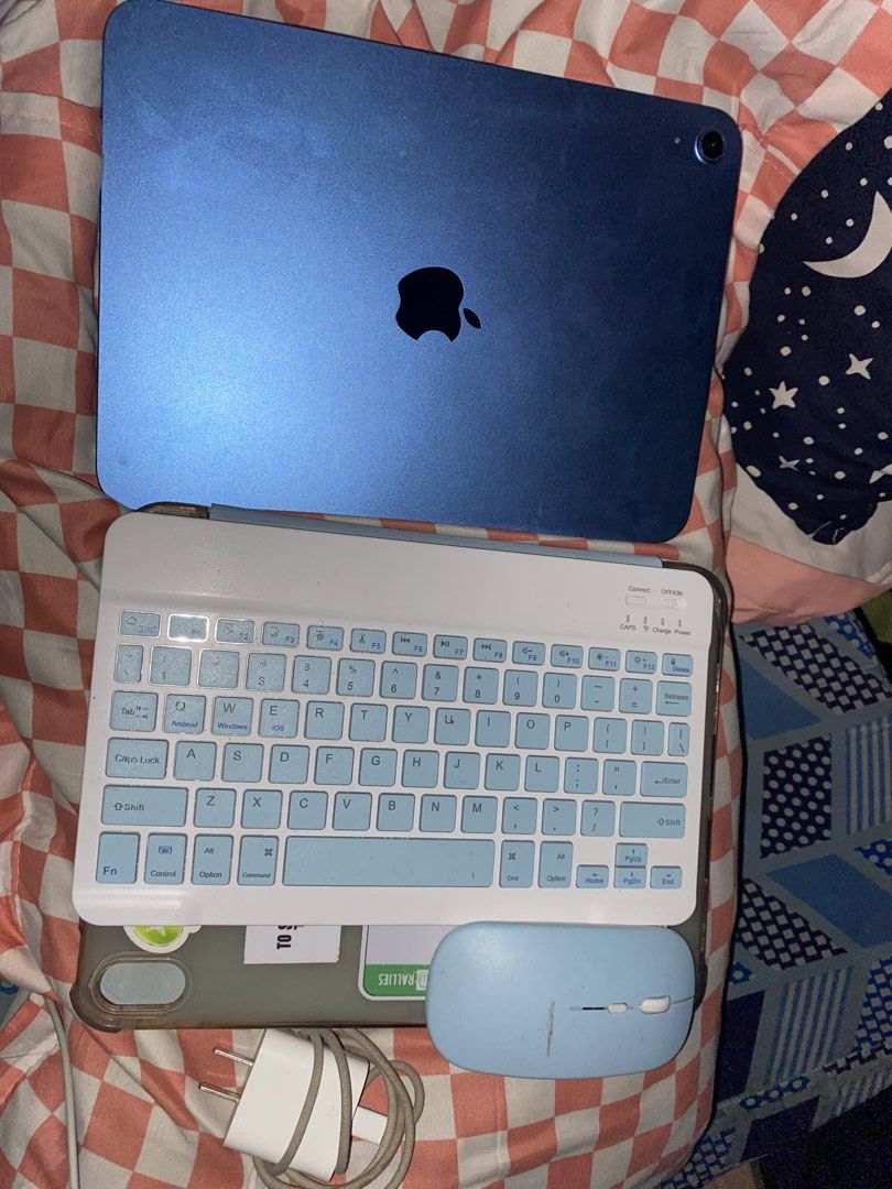 Apple iPad Air (Blue) with Keyboard and Mouse (Category: iPad) located in Manila. Submitted by cyaaaanideex (Listing ID 1441703486, Image 1). Description: ✅ 128GB Storage ✅ Wi-Fi Model ✅ Under Warranty Until August 2026 ✅ 93% Battery Health ✅ No Replaced Parts (All Original) ✅ Good Condition ✅ Updated to the Latest iPadOS Version ✅ Smooth Performance ✅ Unlimited Reset ✅ Ready to Use Inclusions: 📦 Original Charger ⌨️ Bluetooth Keyboard 🖱️ Blueto