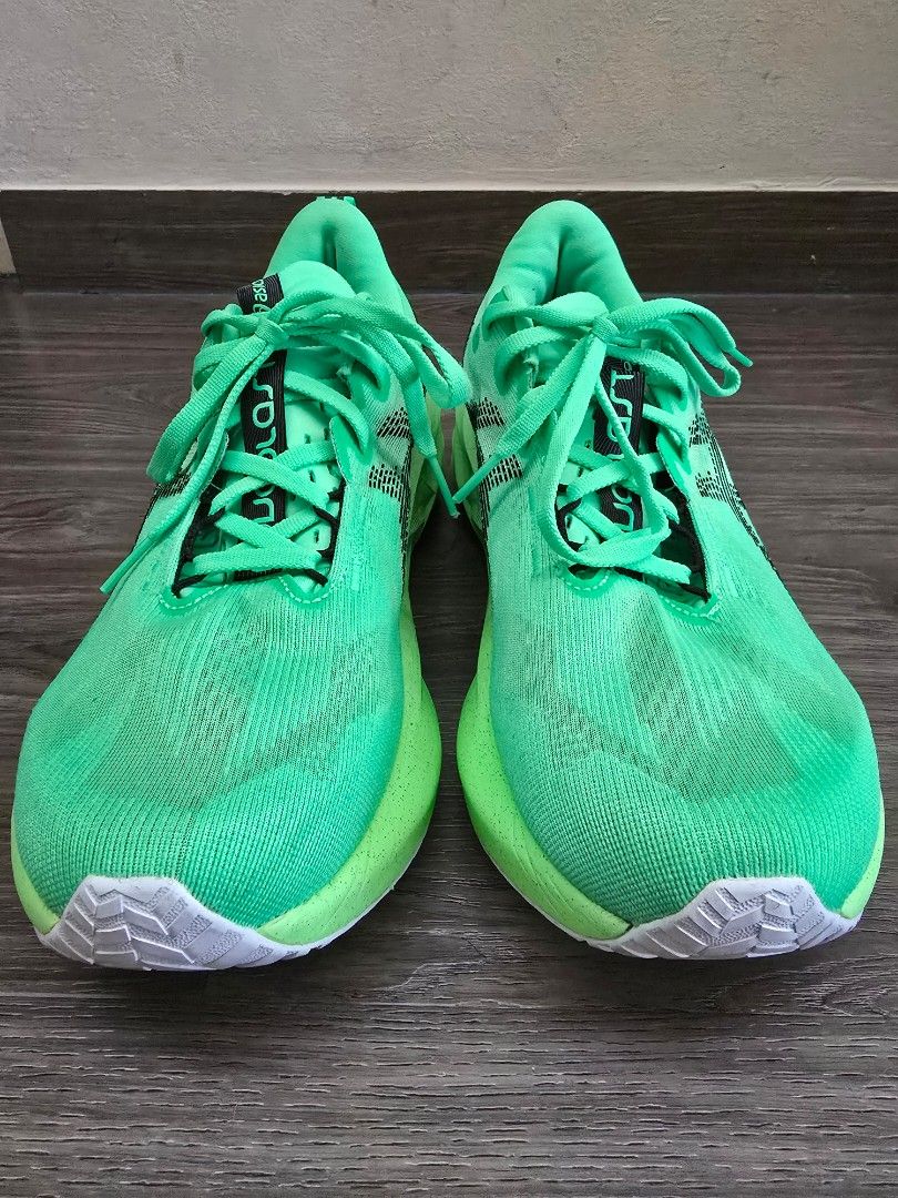 ASICS NOVABLAST 5 Running Shoes (Category: Sneakers) located in Singapore. Submitted by bsportiva (Listing ID 1441690214, Image 1). Description: - ASICS NOVABLAST 5 Running Shoes - Size: Men's EU 43/US 10/UK 9 - Color: Vibrant Neon Green - Features a breathable knit upper for comfort - Distinctive sole design for responsive cushioning - Ideal for daily runs and training - Refer to photo 8-10 for description - Bought on 12/02/2026 - Selling at $17