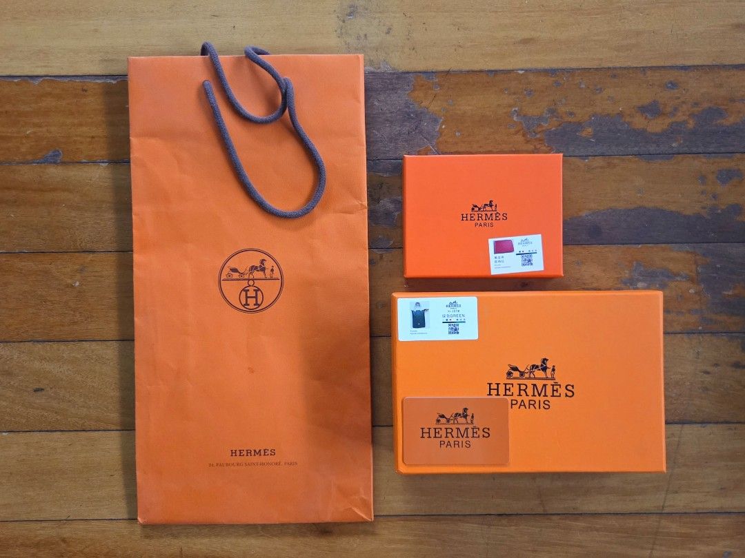 Authentic Hermes Paper Bag (Category: Luxury Bags & Wallets) located in Pasig City. Submitted by ge_borro (Listing ID 1441711250, Image 2). Description: Authentic Hermes Store paper bag with FREE accessory boxes and card (Class A) Bag: 16.25 by 8.25 by 4 inches Box A: 5.5 by 4.25 by 1 inches Box B: 8.5 by 5.75 by 2.75 inches In good condition, with minor signs of storage *Packaging materials only, Hermes Product not included.