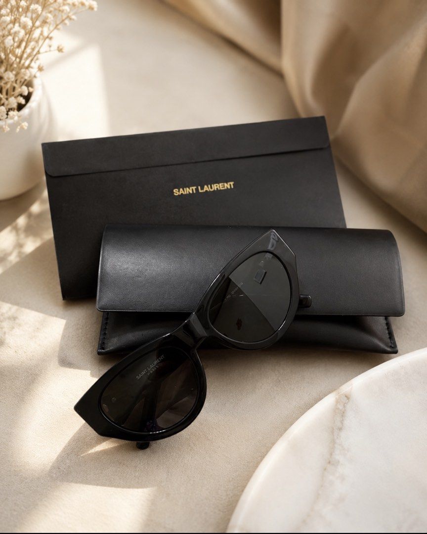 Authentic YSL sunglasses (Category: Sunglasses & Eyewear) located in Kota Kinabalu. Submitted by jill8128 (Listing ID 1441663283, Image 1). Description: Saint Laurent (YSL) SL M94 003 sunglasses,with cases only. Authentic wore only twice.