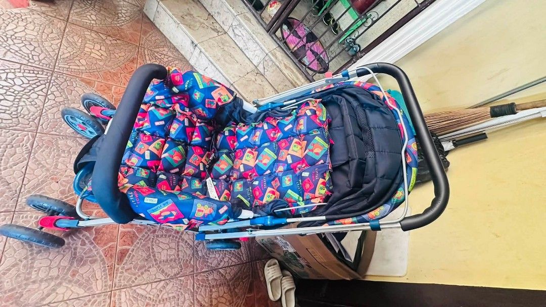 Baby Stroller with Red Accents (Category: Strollers) located in Quezon City. Submitted by albany2022 (Listing ID 1441602972, Image 2). Description: - Lightweight and easy to fold for portability - Features stylish red accents on handles and wheels - Perfect for everyday use - Shows some signs of wear on frame and wheels, but fully functional - Ready for its next adventure!.