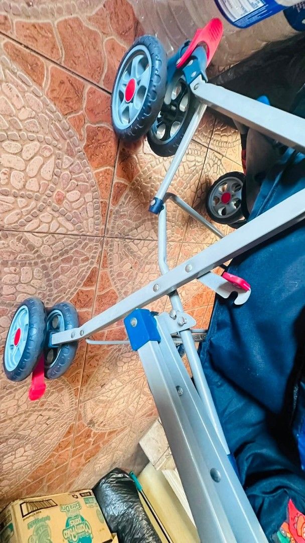 Baby Stroller with Red Accents (Category: Strollers) located in Quezon City. Submitted by albany2022 (Listing ID 1441602972, Image 1). Description: - Lightweight and easy to fold for portability - Features stylish red accents on handles and wheels - Perfect for everyday use - Shows some signs of wear on frame and wheels, but fully functional - Ready for its next adventure!.