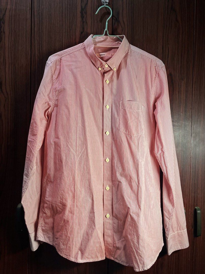 Baleno Pink Striped Button-Up Shirt (Category: Shirts) located in Manila. Submitted by chiyooo787 (Listing ID 1441758055, Image 1). Description: 26L by 20W Brand: Baleno Size: M Color rate: 9/10 Issue: small yellow and pink stains in right sleeves but not noticeable rfs: not my size anymore but would love to keep it since it looks cutesy +sf for buyers.