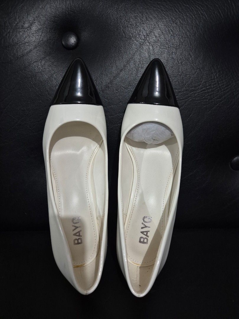 BAYQ White Black Cap Toe Heels Pumps (Category: Heels) located in Quezon City. Submitted by conchicken (Listing ID 1441745937, Image 1). Description: - Classic white and black cap toe heels from BAYQ. - Elegant pointed toe design. - Comfortable and stylish block heel. - Versatile for work or evening wear. - Easily pairs with any outfit. - size 7, wore 2x only inside office bought fr US. VERY ELEGANT..