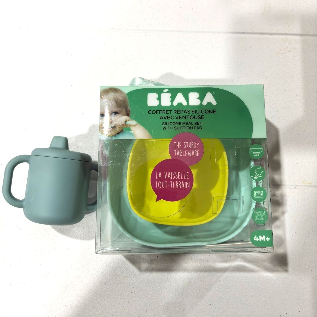 BEABA Silicone Meal Set with Suction Pad (Category: Weaning & Toddler Feeding) located in Pasay City. Submitted by declutteringmomshi (Listing ID 1441726704, Image 1). Description: 2 plates is already 2199 (big plate used less than 5x. Small plate never used. Free Beaba Sippy cup - slightly used - BEABA Silicone Meal Set - Includes suction plate and sippy cup - Ideal for babies 4 months and up - Plate features a strong suction base to prevent spi