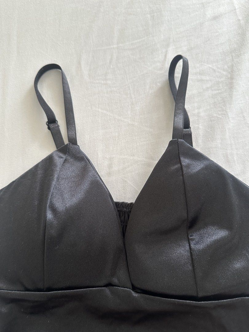 Black Satin Smocked Back Crop Top (Category: Sleeveless) located in Paranaque City. Submitted by declutterwyae (Listing ID 1441625487, Image 2). Description: - Sleek black satin fabric - Adjustable straps for a customized fit - Comfortable smocked back - Perfect for pairing with high-waisted skirts or pants - Easily dressed up or down for any event.