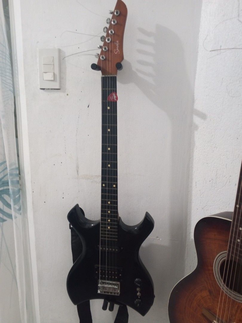 Black Sonata Electric Guitar with Davis amp (Category: Musical Instruments) located in Manila. Submitted by miyskii (Listing ID 1441759704, Image 2). Description: Black Sonata Electric guitar with Davis amp inclusions: -1 guitar pick -bag -cord Issue -a little crack on the neck -old strings MOD Gcash only‼️ Shipping is shouldered by the buyer‼️ Payment first before shipping‼️ rfs: I'm no longer using it, been too busy with school.
